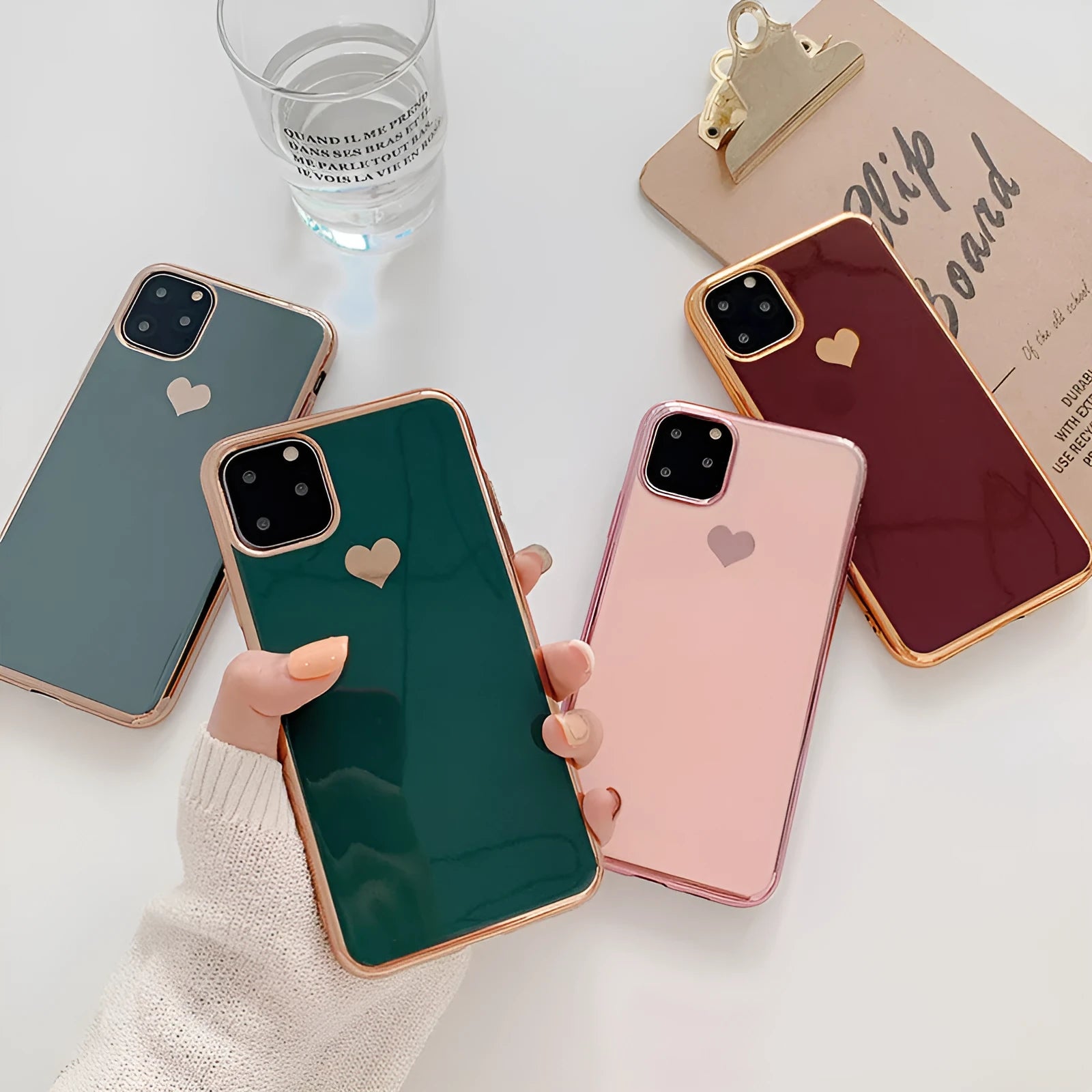 Solid colour TPU phone case for iPhone models showing precise camera and port cutouts