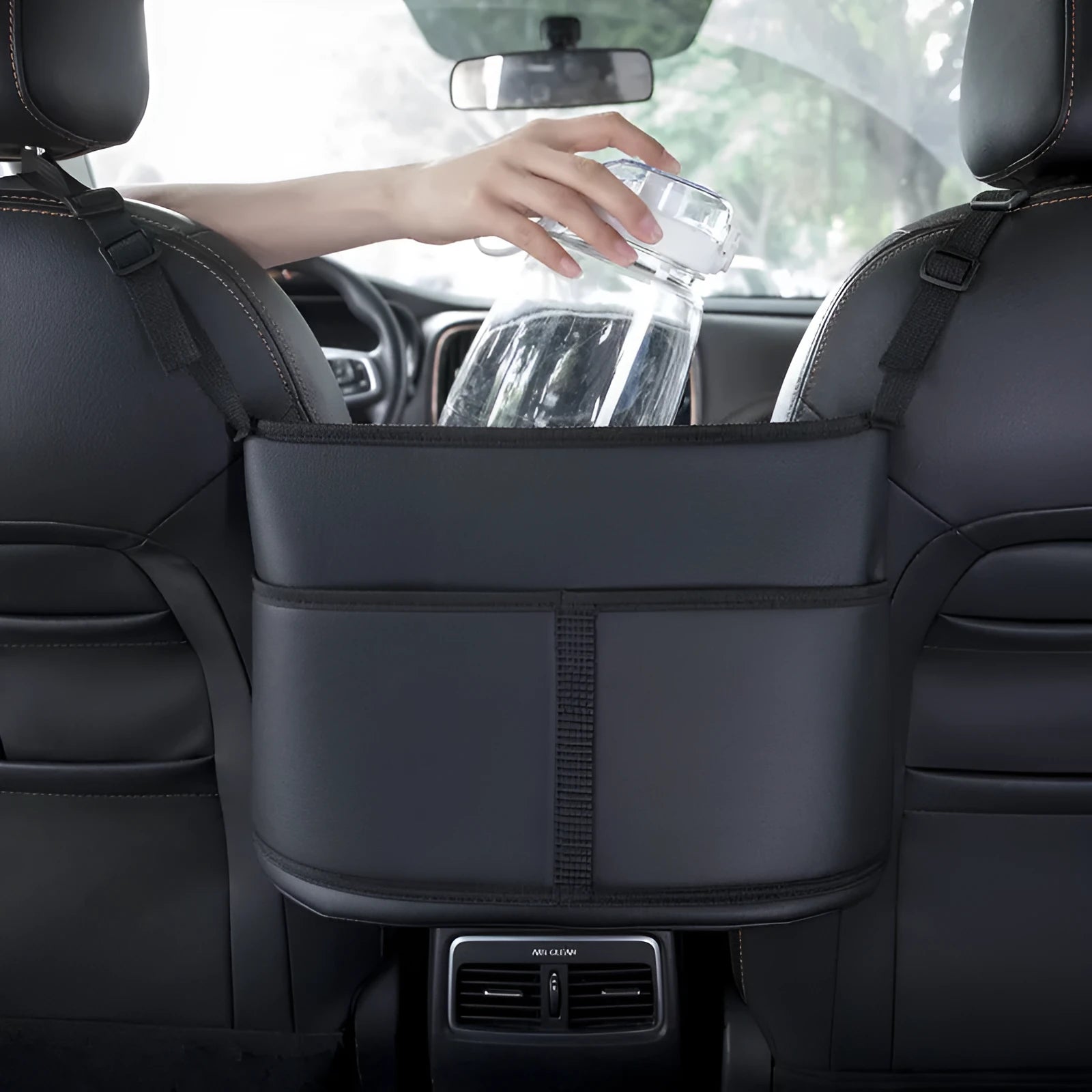 Black leather car seat storage bag with carbon fibre pattern measuring 38cm wide