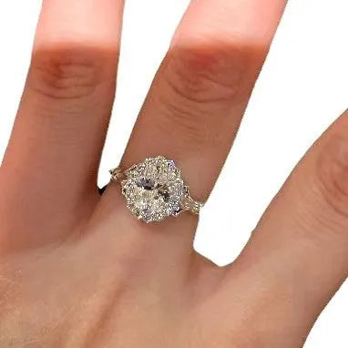 Silver adjustable geometric ring with diamond treatment and bridal bouquet design elements