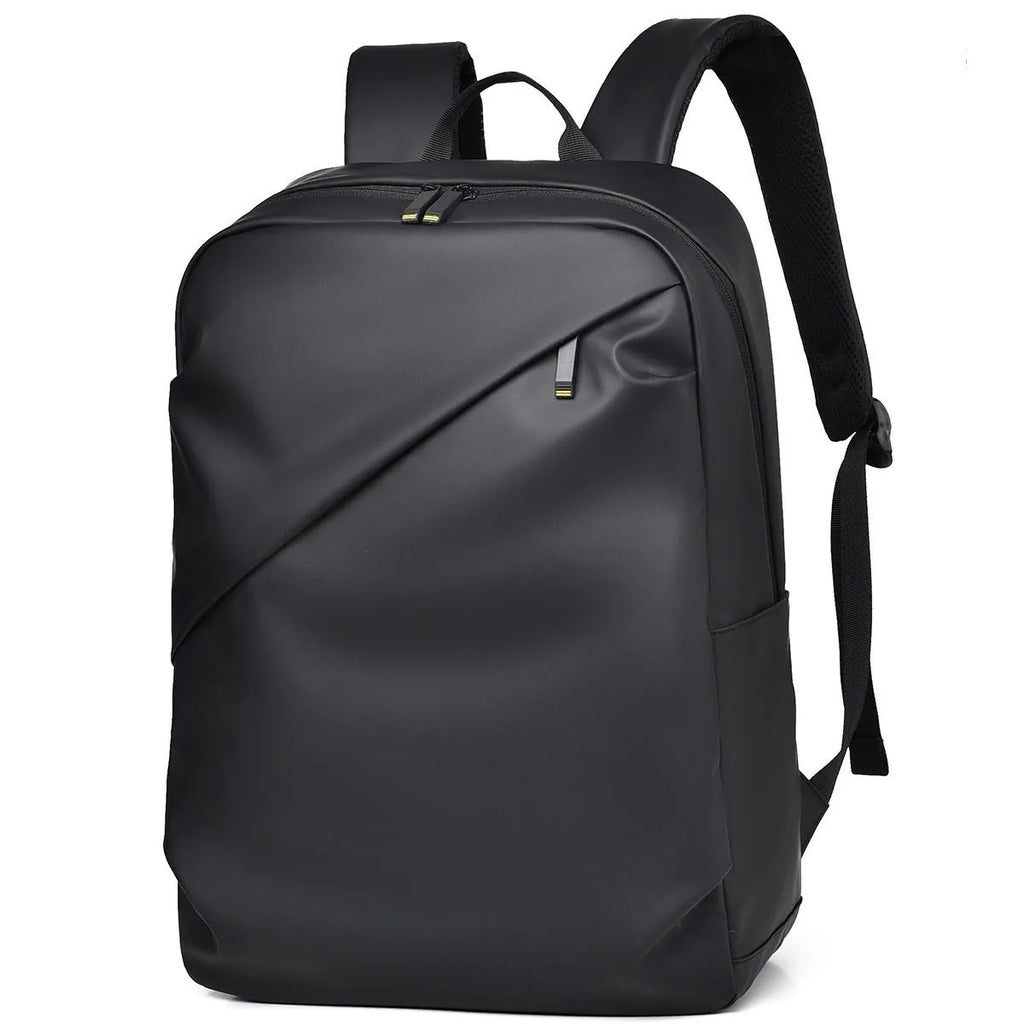 Large simple design waterproof backpack in grey with visible stitching, shown with a separate computer bag.
