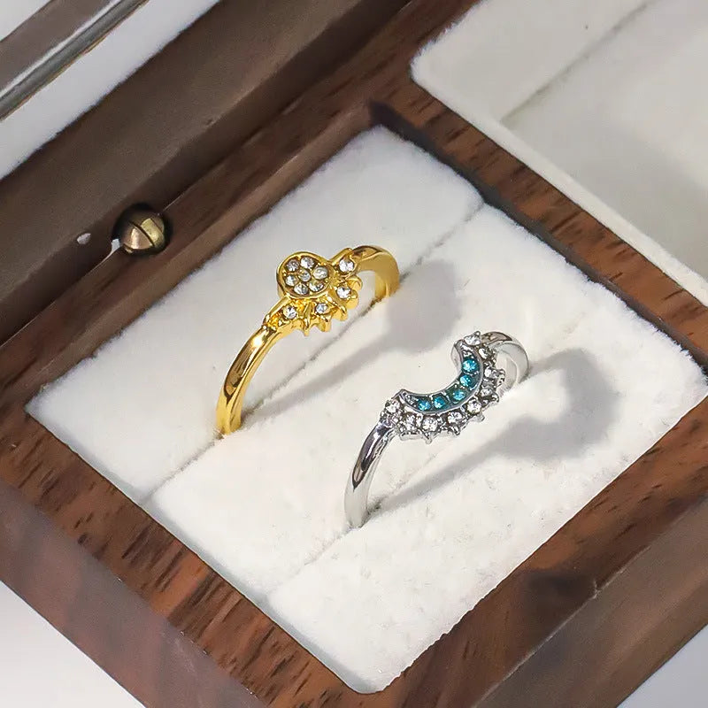 Sun And Moon diamond-studded alloy geometric couple ring set with sun and moon motifs