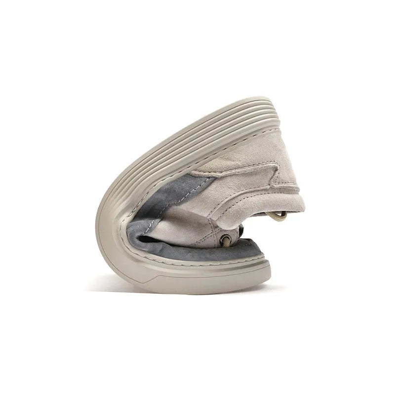Men's grey low-top casual leather skate shoes with a round toe and flat rubber sole.