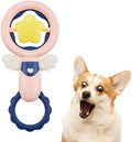 Pink interactive dog toy set for large breeds with squeaky and dental toys on a light background