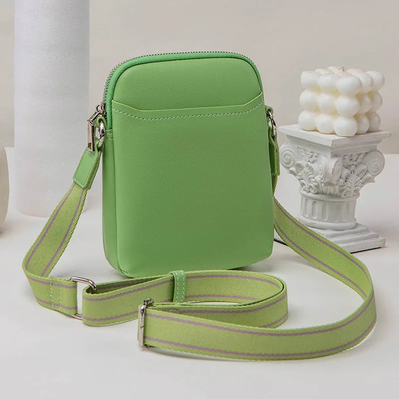 Solid colour PU leather mobile phone shoulder bag showing crossbody and shoulder carry options