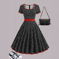 Square collar short sleeve polka dot dress with front zipper and pleated midi skirt