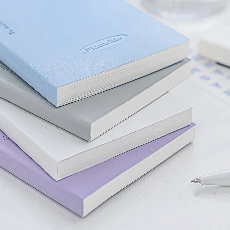 A5 embossed simple design meter book notebook with a paper cover.
