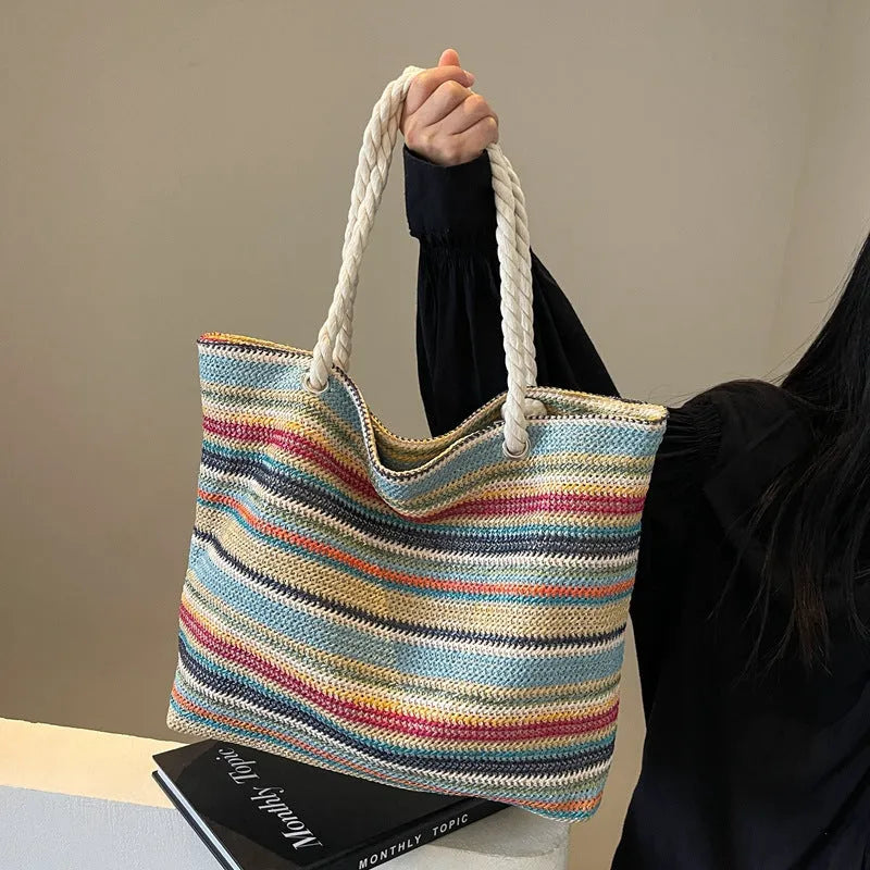 Blue straw woven nylon shoulder bag with single strap and polyester lining