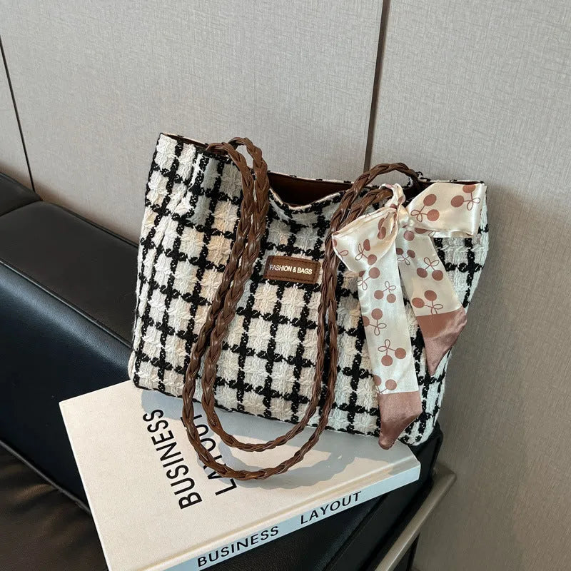Woolen shoulder bag in black with horizontal square shape and sandwich pocket for commuting and shopping use