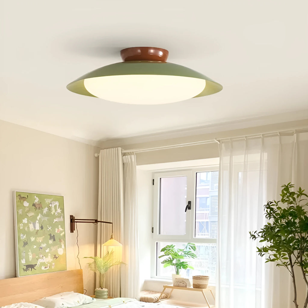 Modern minimalist flying saucer ceiling lamp in cream style with iron shade
