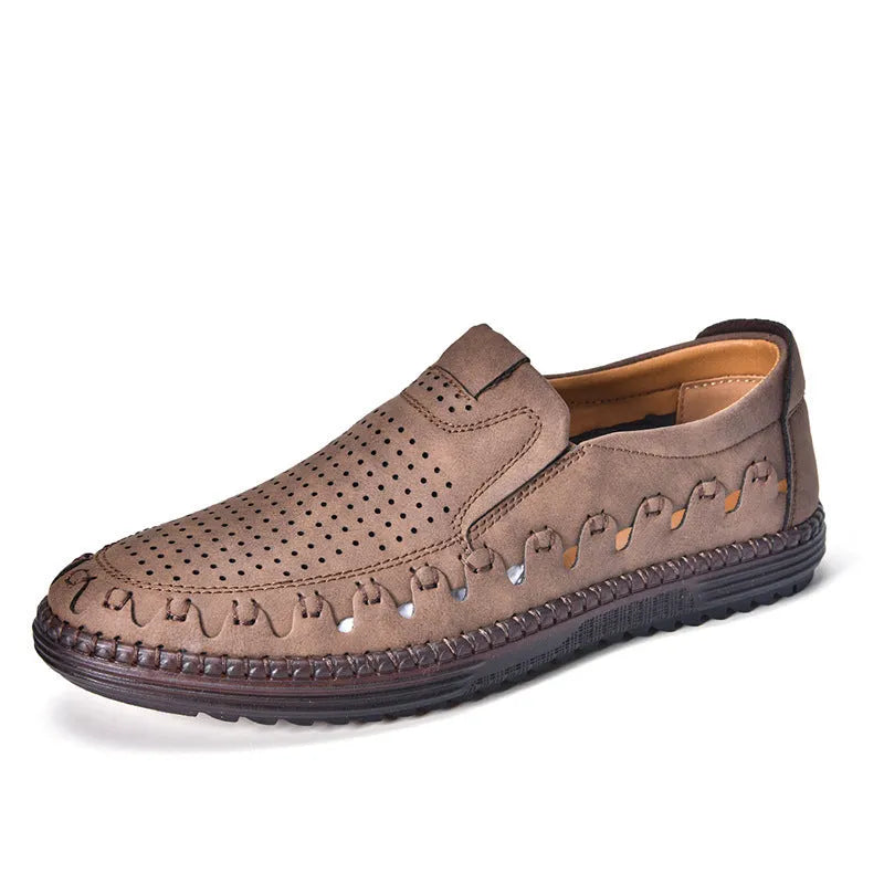 Men's brown slip-on casual shoes with round toe and sewing line detailing on flat PVC sole