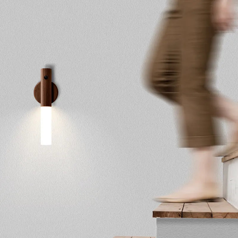 Smart sensor LED desk lamp made of solid wood and organic glass on a wooden desk