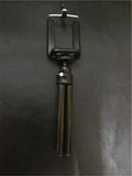 Black desktop phone holder with two-section adjustable metal bracket and clamp base
