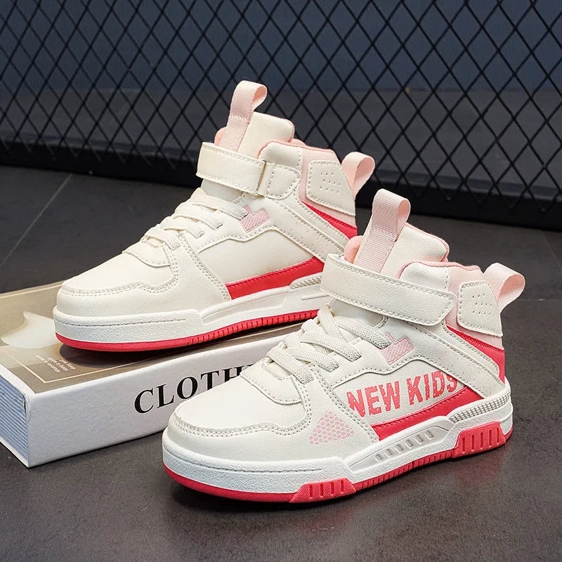 Children's coloured buckle-closure outdoor sneakers on a white background showing PU upper and rubber sole