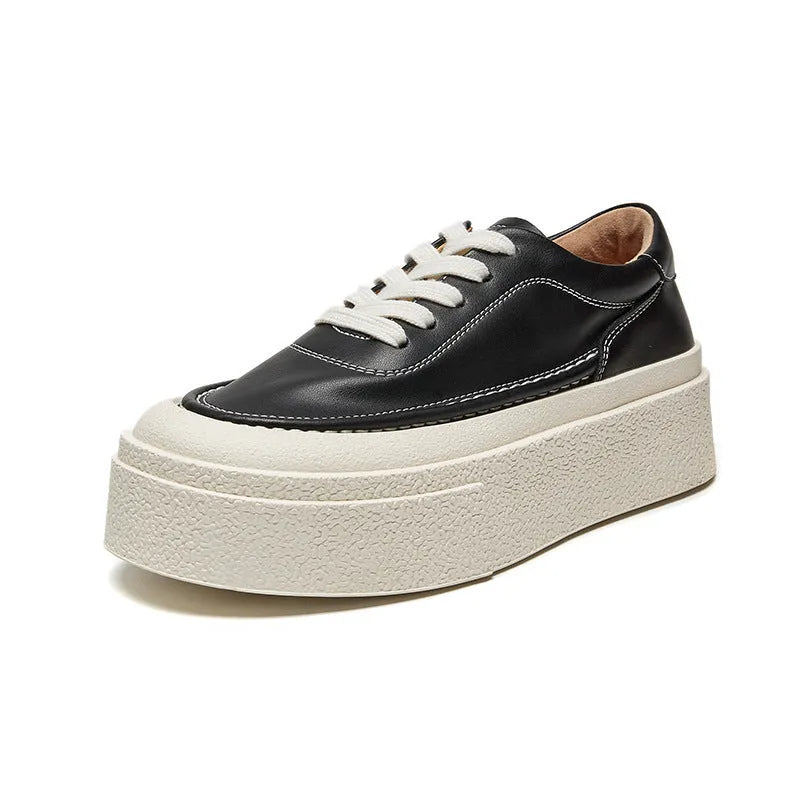 Women's tied platform sports board shoes in black with round toe, cowhide upper, and rubber sole