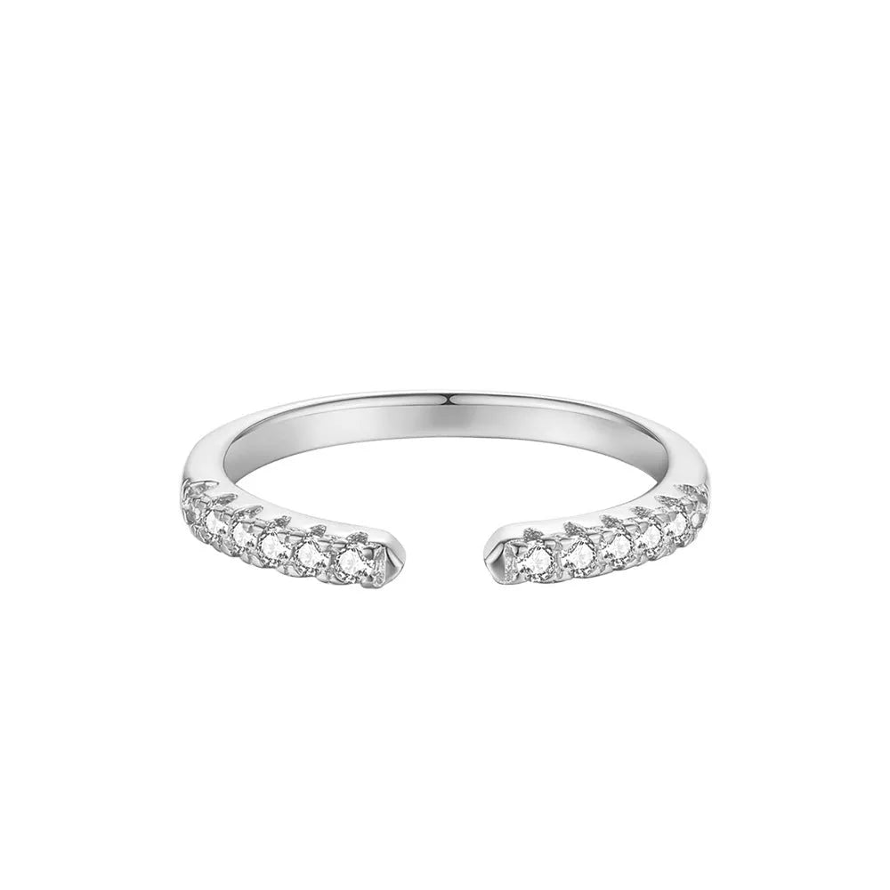 Silver adjustable geometry ring with electroplated platinum rehearsal diamond finish on finger
