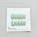 Electroplated Cat's Eye false nail set with aurora finishes in short ladder XS S M sizes