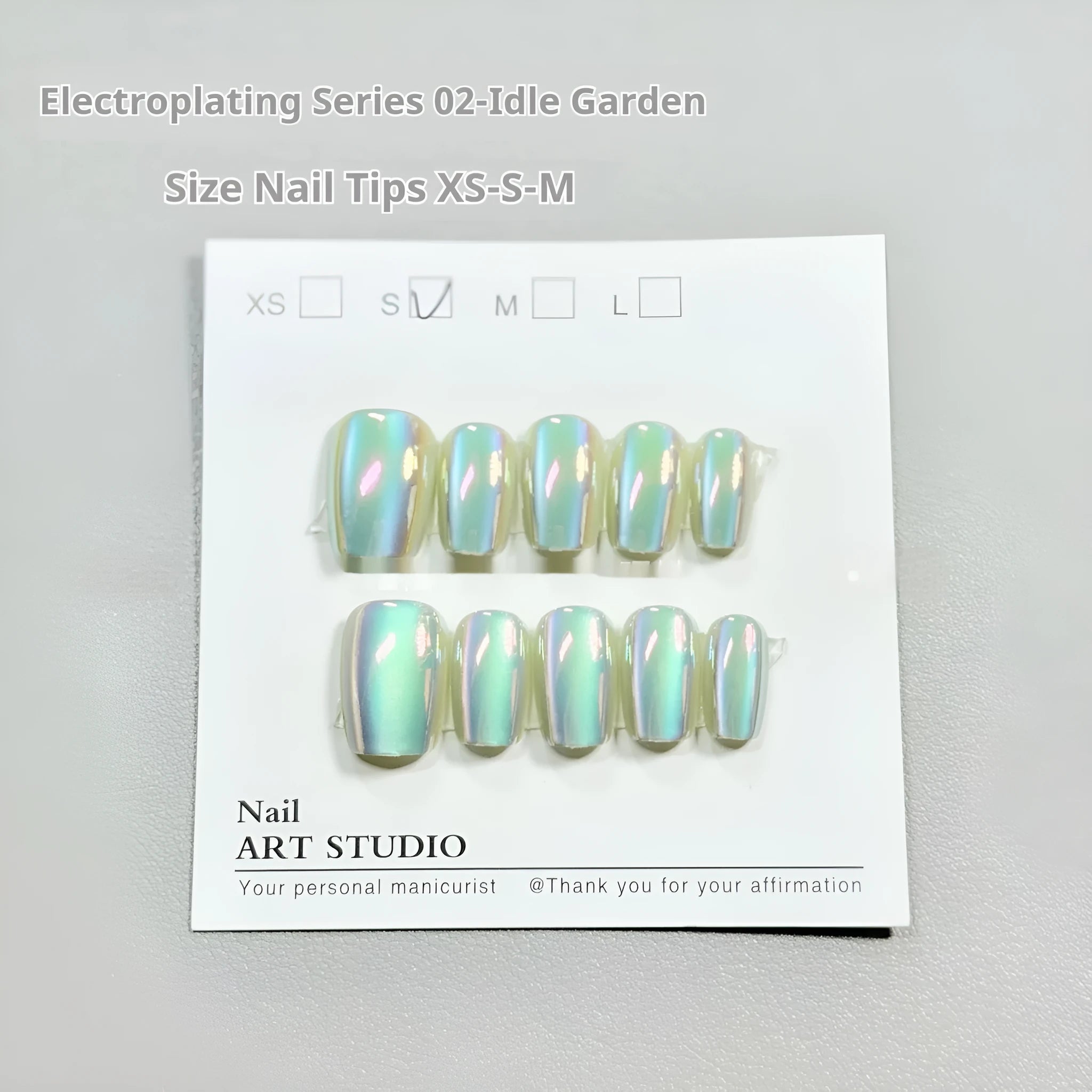 Electroplated Cat's Eye false nail set with aurora finishes in short ladder XS S M sizes