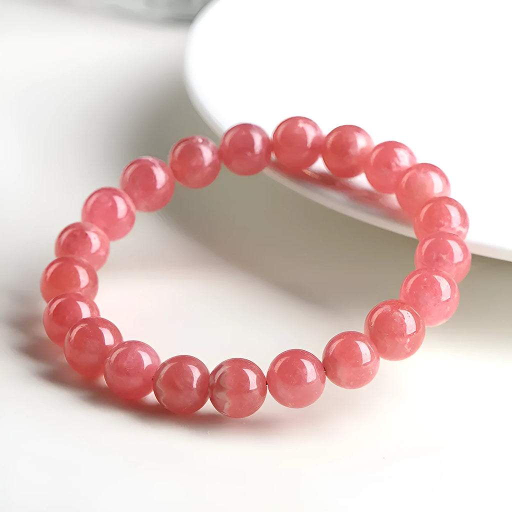 Women's red crystal bracelet with geometric stone beads and longevity lock fastening