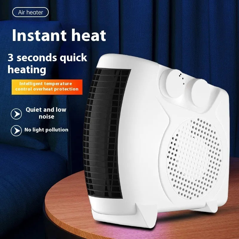Small white electric heater with compact design for desktop placement showing front ventilation grille.