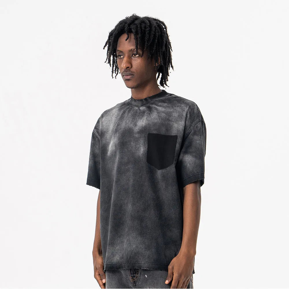 Black men's loose fit cotton t-shirt with printed white letter design and drop-shoulder sleeves.