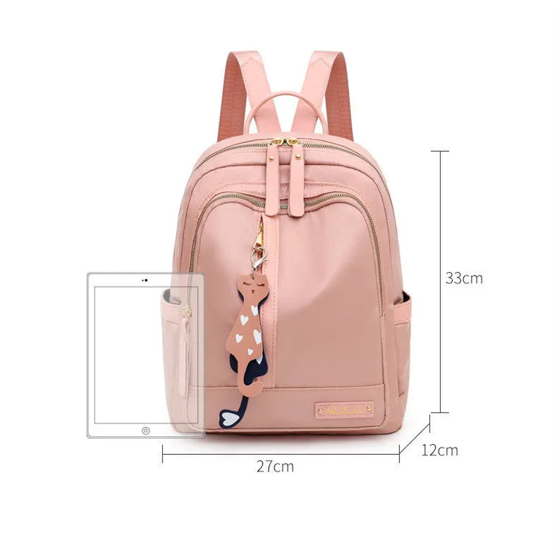 Black casual nylon backpack with shoulder straps showing internal organisation compartments