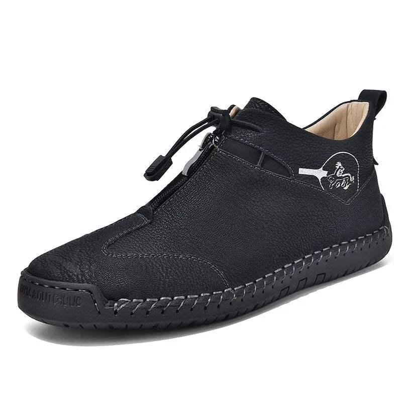 Men's black casual leather shoes with a round toe and mid-height rubber sole.