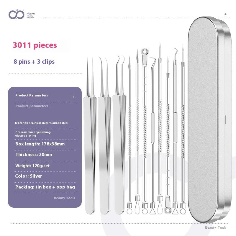 Four silver metal acne needles with fine pointed tips laid out on a surface.