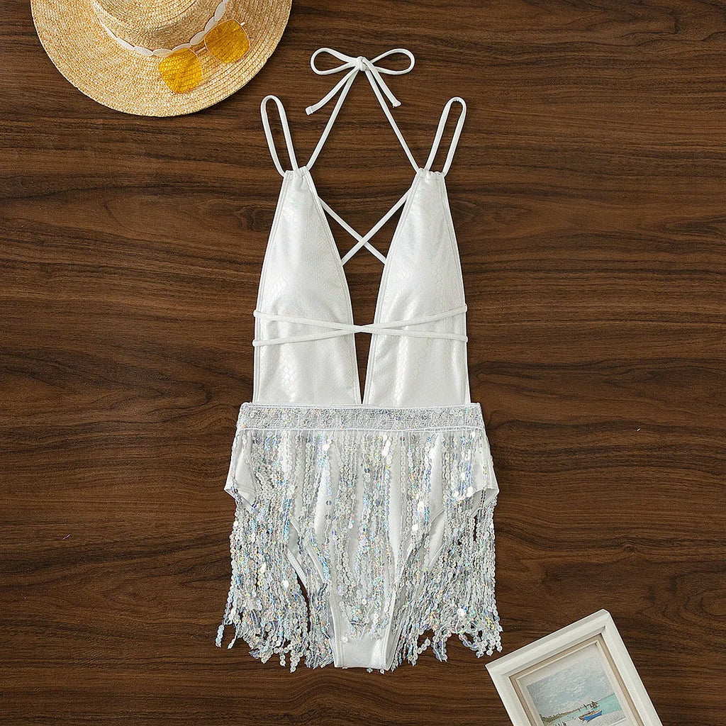 White deep V neck one-piece swimsuit with tassel detail and brief style