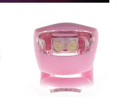 LED bike safety light with flexible silicone body and clip-on attachment in multiple colours