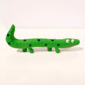 Green cartoon lizard shaped dog chew toy with squeaker for aggressive chewers