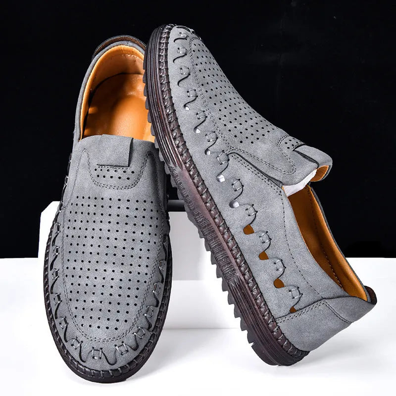 Men's brown slip-on casual shoes with round toe and sewing line detailing on flat PVC sole