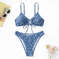 Blue women's swimsuit three-piece set with separate top and shorts