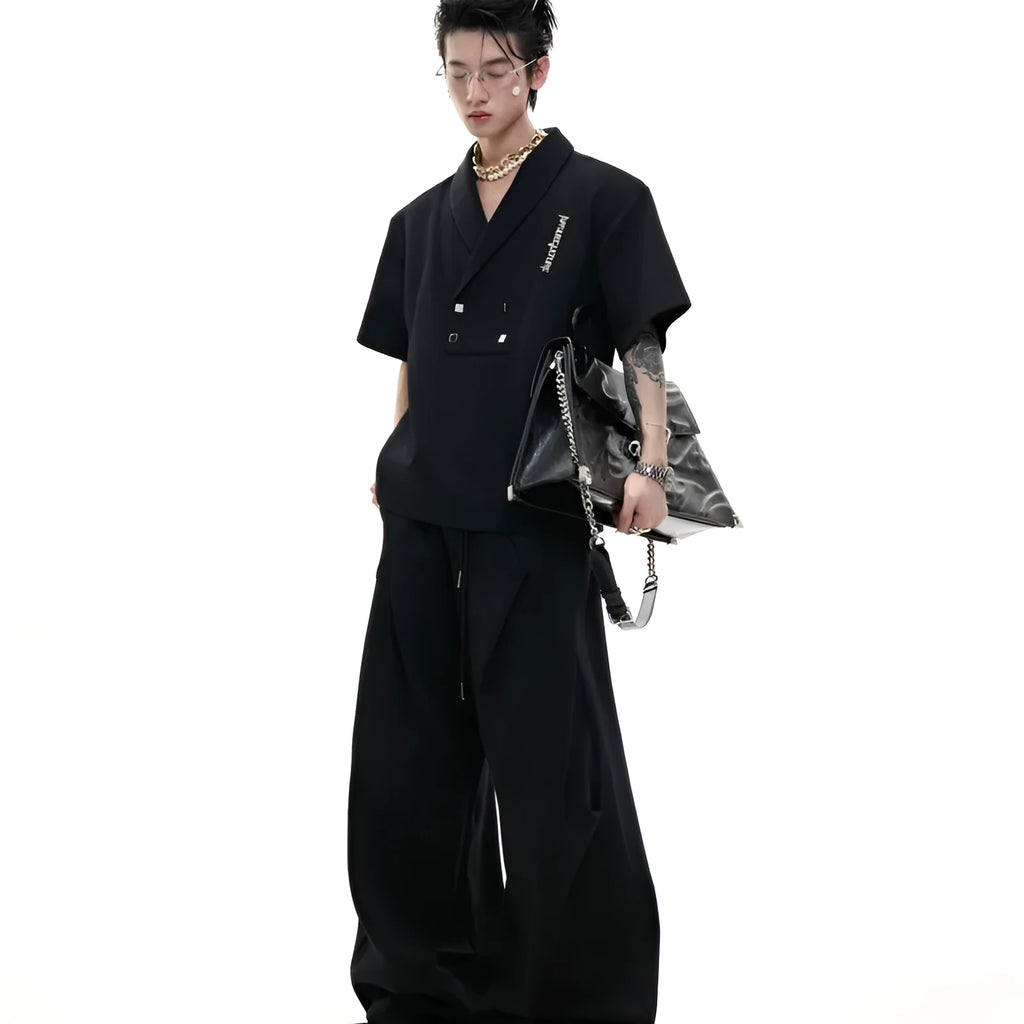Men's dark grey V-neck sports suit with metal embellished jacket and matching athletic shorts