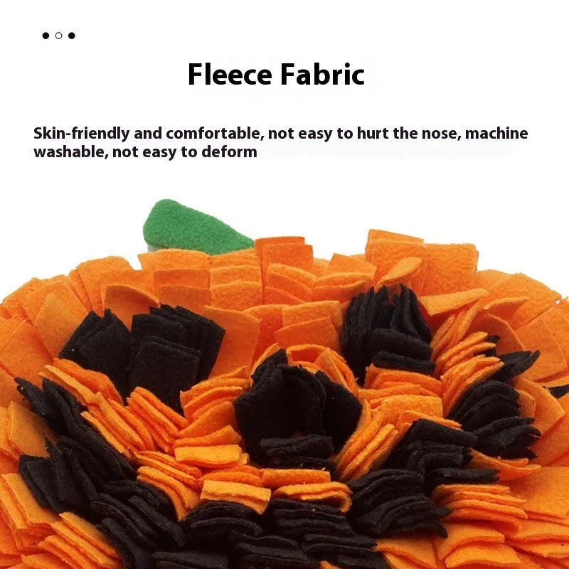 Orange pumpkin-shaped dog smell mat with fabric strips for slow feeding