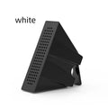 Portable black ABS plastic phone amplifier holder with an iPhone inserted, shown on a desktop.