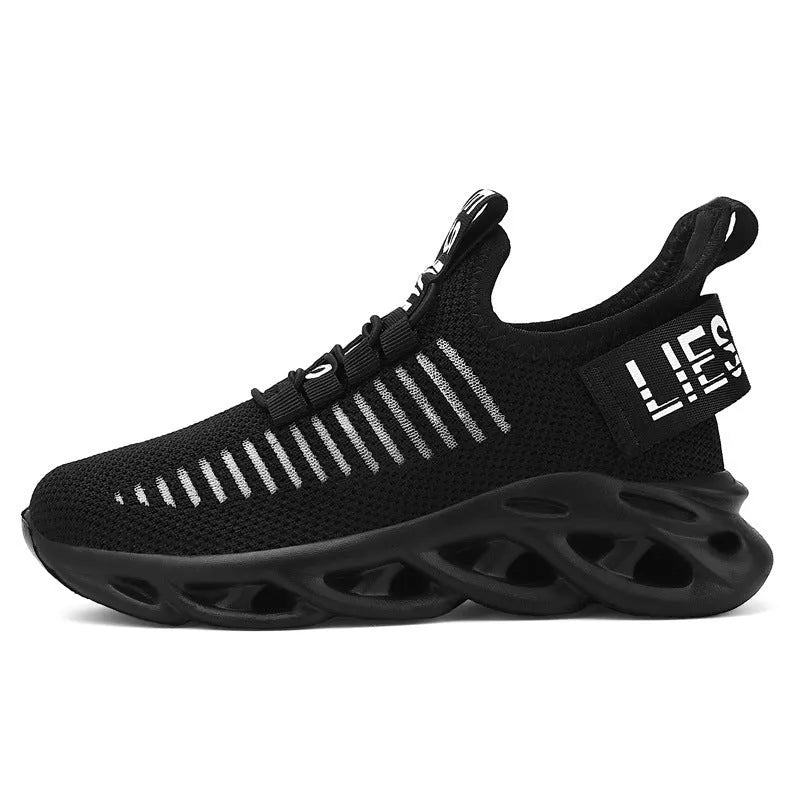 Kids black coconut fabric Velcro sneakers with lightweight EVA sole on a white background.