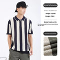 Man wearing a black and white stripe short sleeve viscose sweater with a silver zip decoration on the chest.