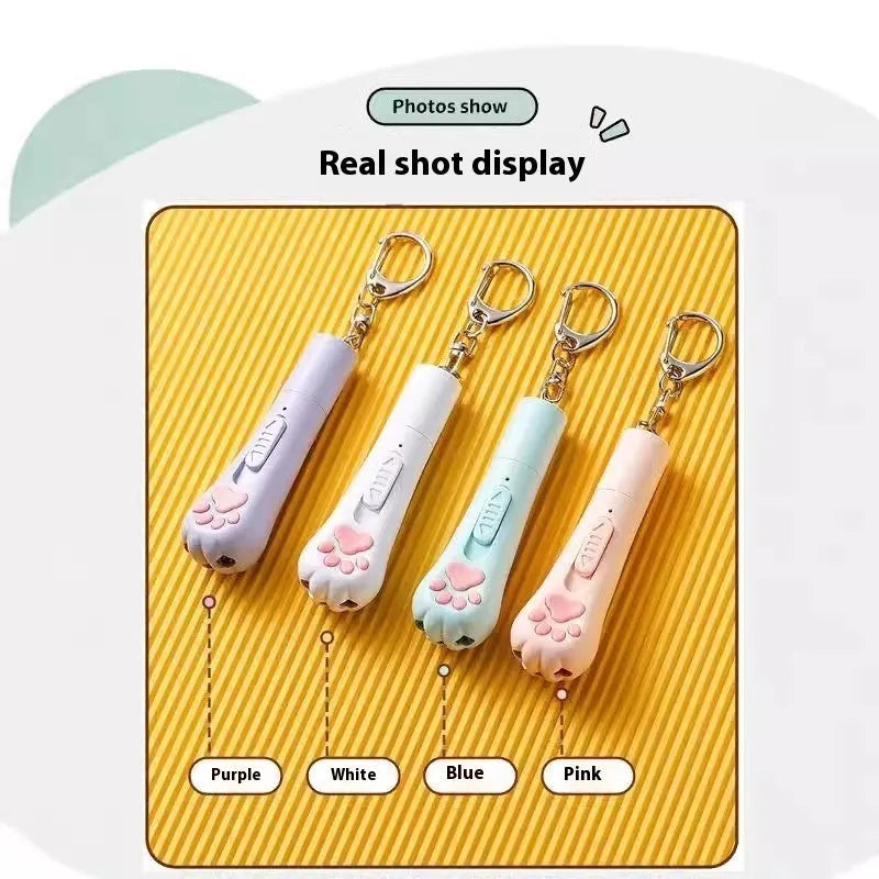 Battery-operated cat pen light toy in cream white, girl pink, or sky blue with self-hi relieving stuffy mechanism