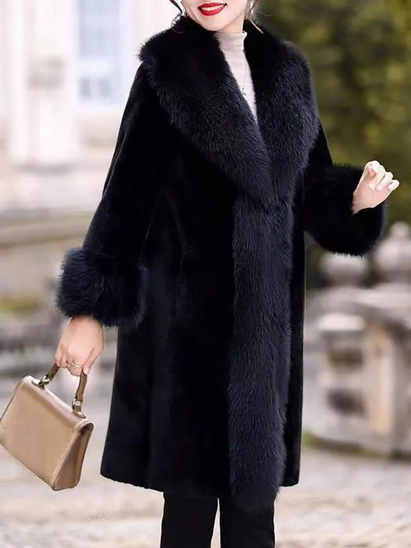 Women's grey faux rabbit fur mid-length coat with a fur collar on a hanger.