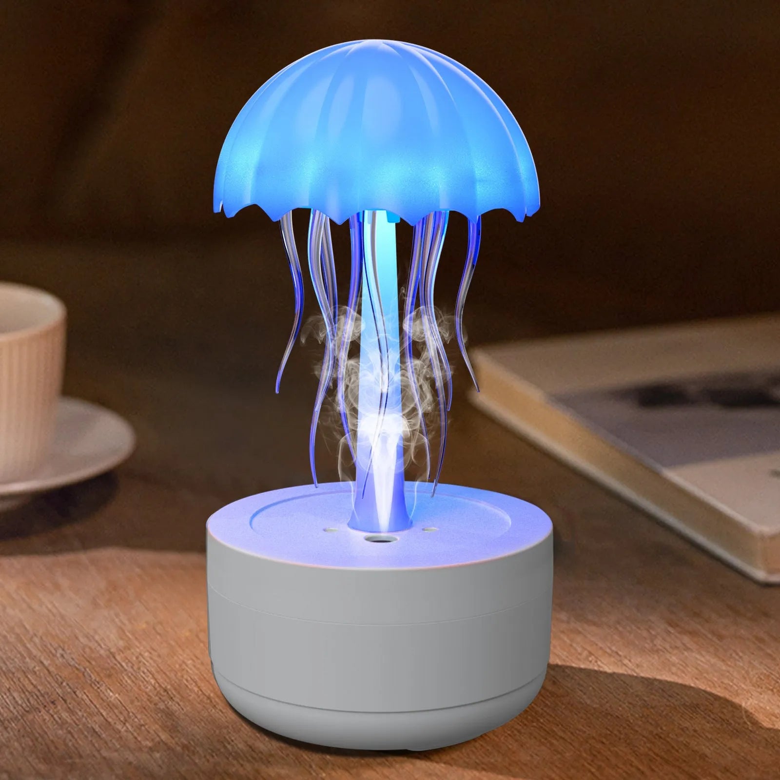 White resin jellyfish aromatherapy diffuser with 7-colour night light and 300ml tank on a desk
