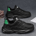 Men's solid colour breathable mesh casual shoes with round toe in white or black.