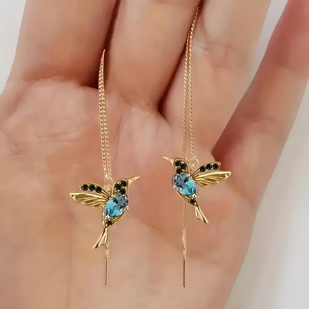 Long hanging earrings with bird decoration featuring mixed zirconium wings on alloy chains