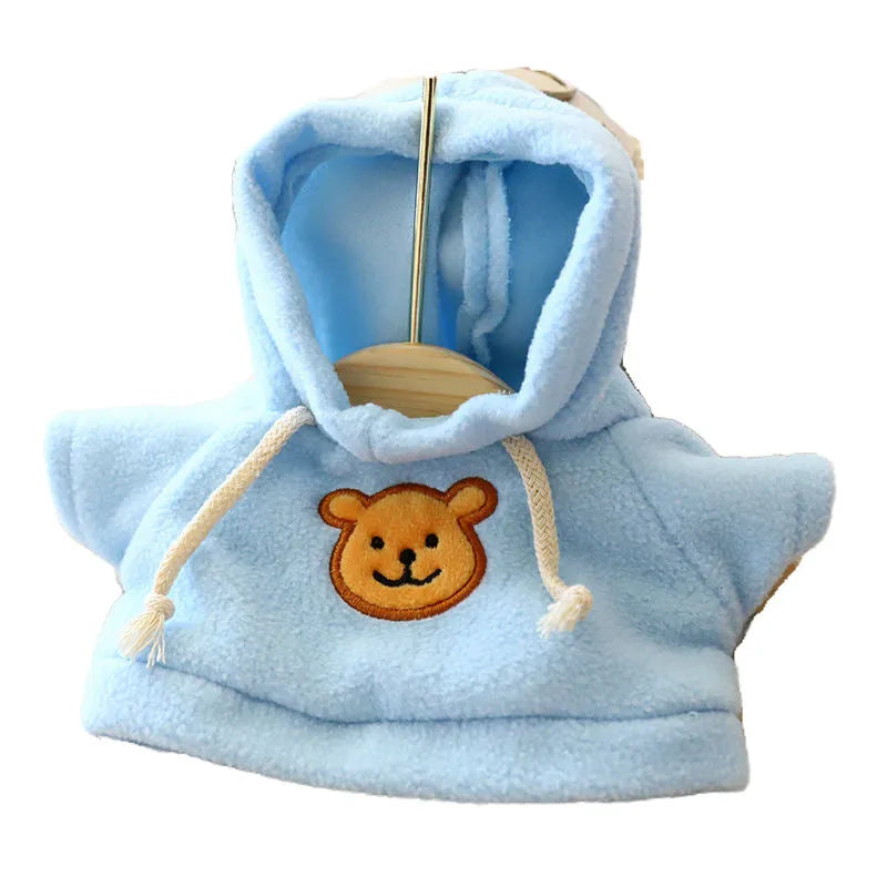 Blue dog hoodie sweater on a small dog, showing the hood and cloth material.