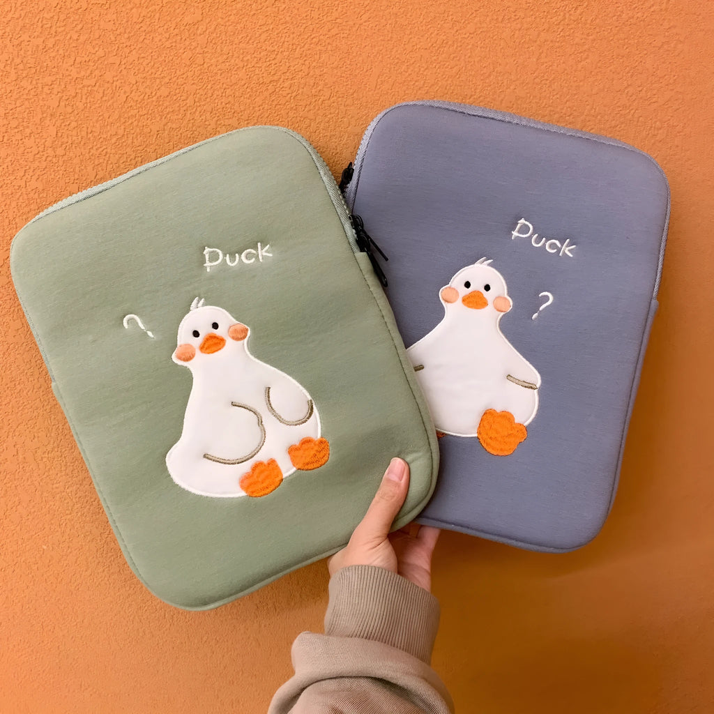 Blue cotton tablet case with duck embroidery design and zipper closure for iPad protection