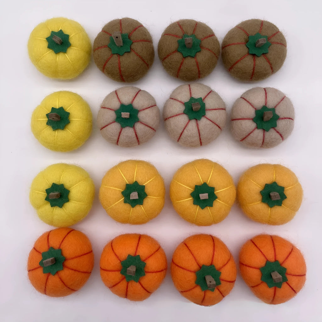 Wool felt pumpkin poke ornament in orange, approximately 5cm diameter and 4.5cm height, for doll decoration