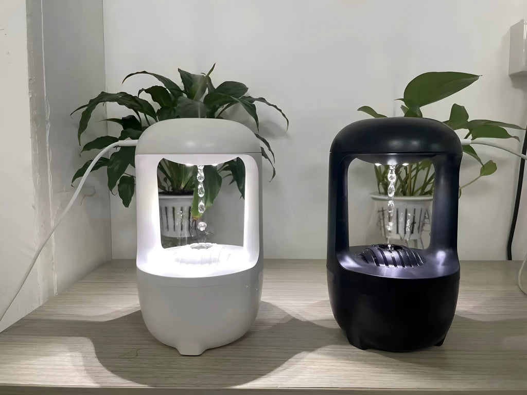 Anti gravity water drop backflow humidifier with 500ml tank in white on a desk