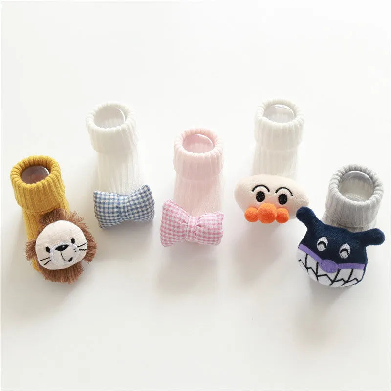 Cotton baby socks in blue bow design showing breathable fabric and size options for 0-3 month olds