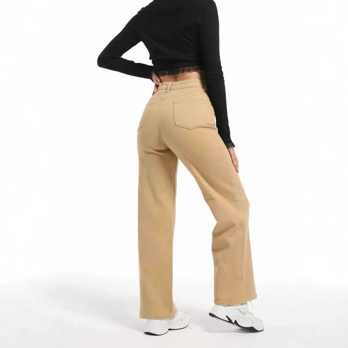 Women's apricot wide leg straight jeans with high waist on a hanger