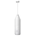 Mini handheld electric milk frother in black, white, or khaki with stainless steel whisk.