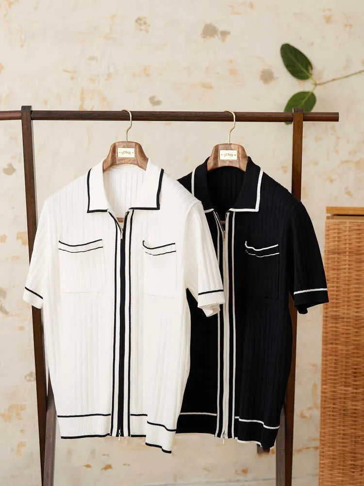 Slim-fit black lapel polo shirt with short sleeves on a hanger, showing elastic knitted texture.